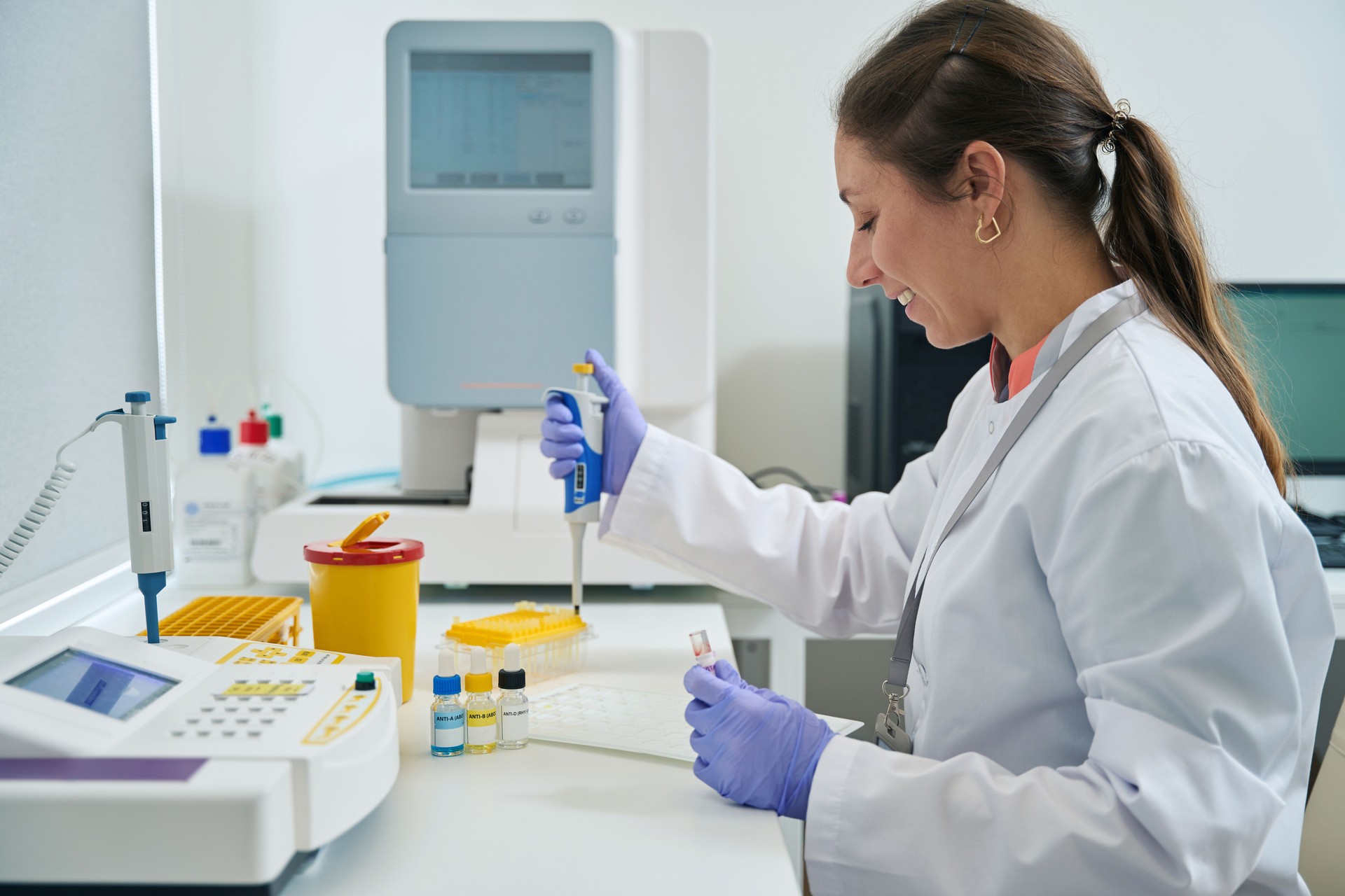 Geneticist collects a sample of biomaterial for a test